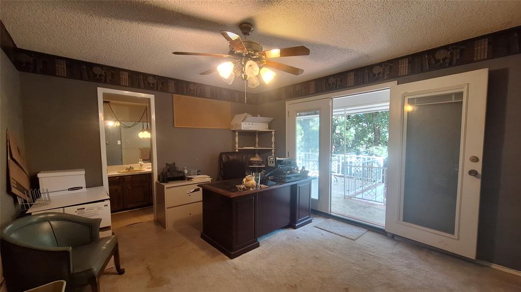 613 Colts Neck Court Colleyville, TX 76034 - Photo 34 of 38 upstairs rear bedroom 5 or gameroom with access to spacious balcony patio and ensuite bath