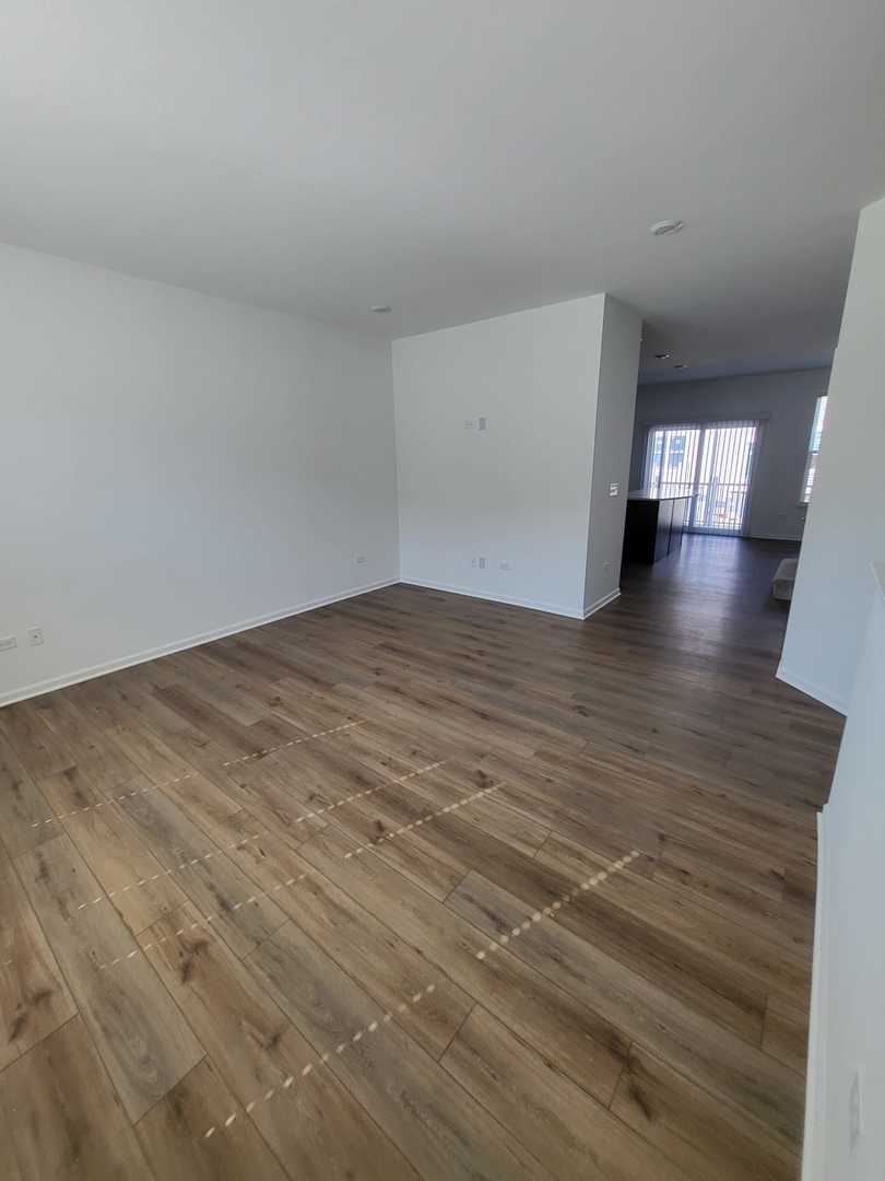 588 Wolverine Drive Aurora, IL 60502 - Photo 12 of 29 wooden floor in a room