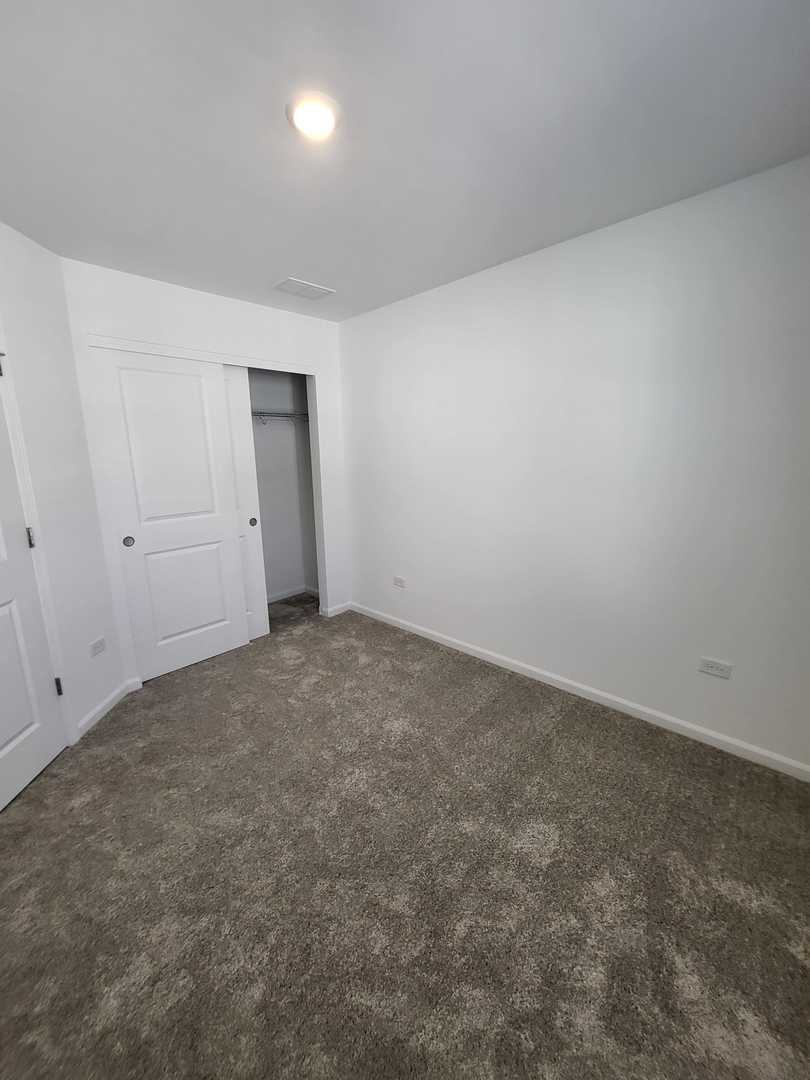 588 Wolverine Drive Aurora, IL 60502 - Photo 22 of 29 a view of an empty room and entryway