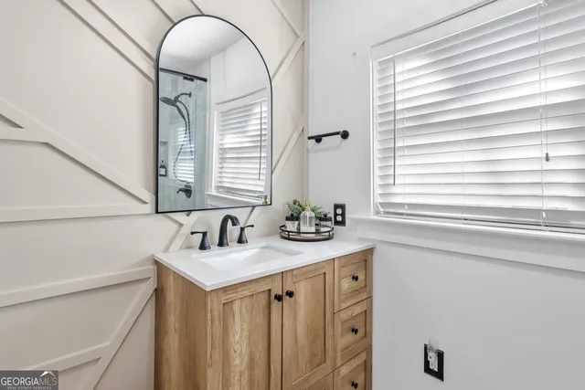 a view of a swimming pool with lounge chairs