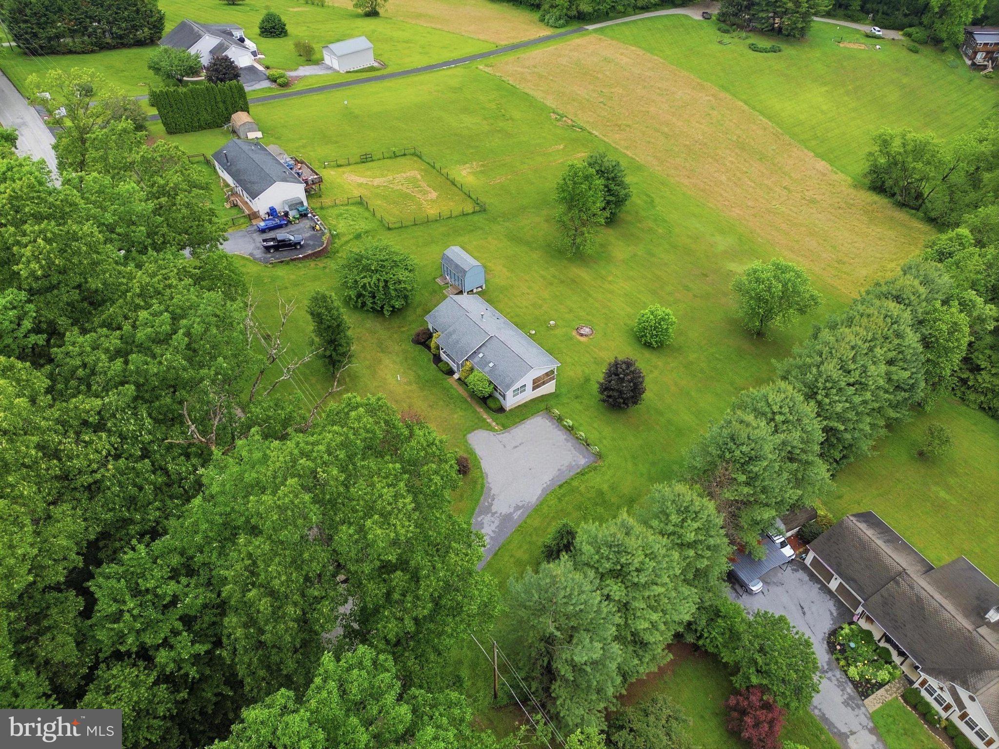 491 Garvine Mill Road Fawn Grove, PA 17321 - Photo 41 of 47 an aerial view of residential house with outdoor space and swimming pool