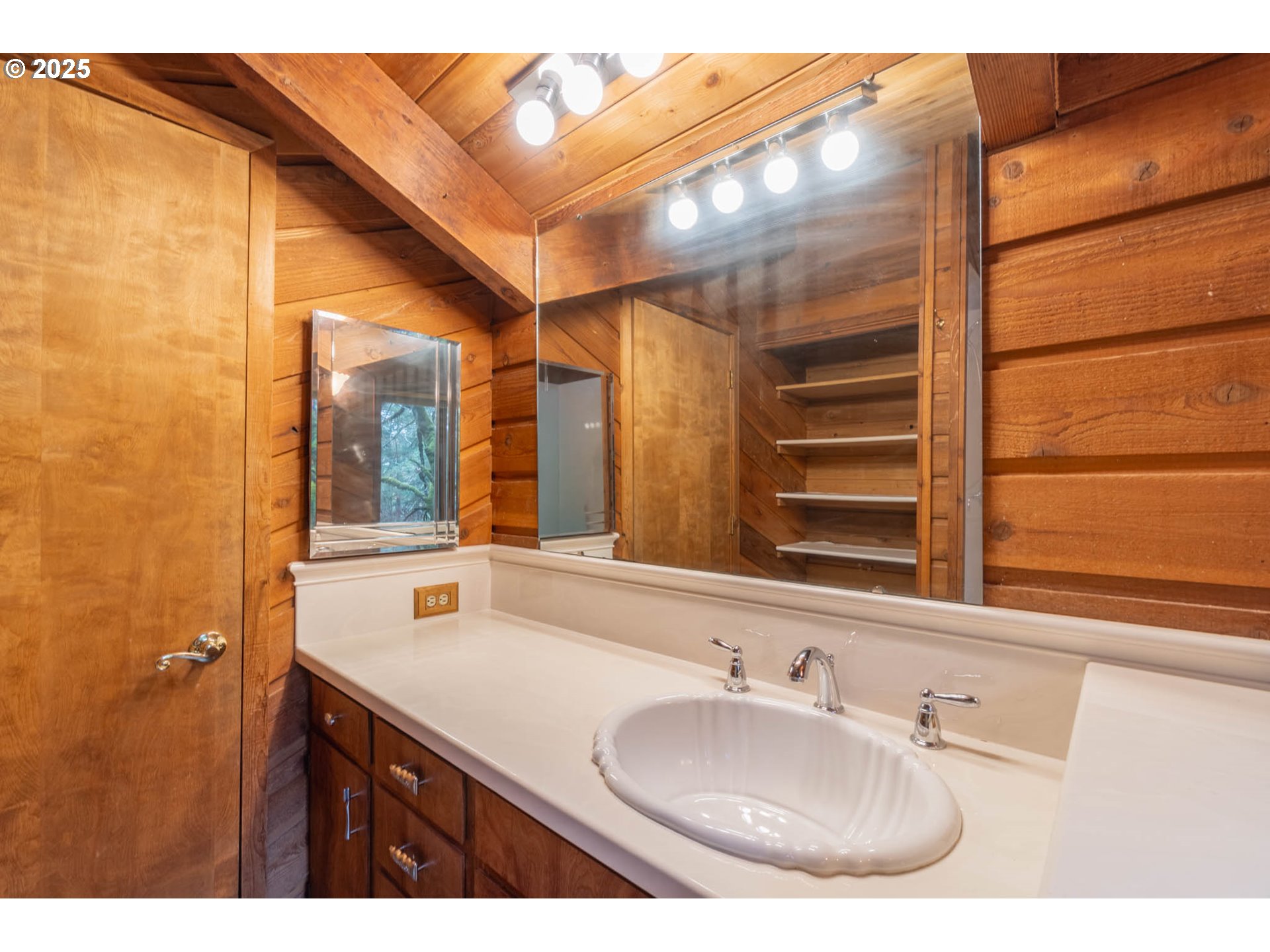 3054 Hendricks Hill Drive Eugene, OR 97403 - Photo 12 of 25 a bathroom with a sink and a mirror
