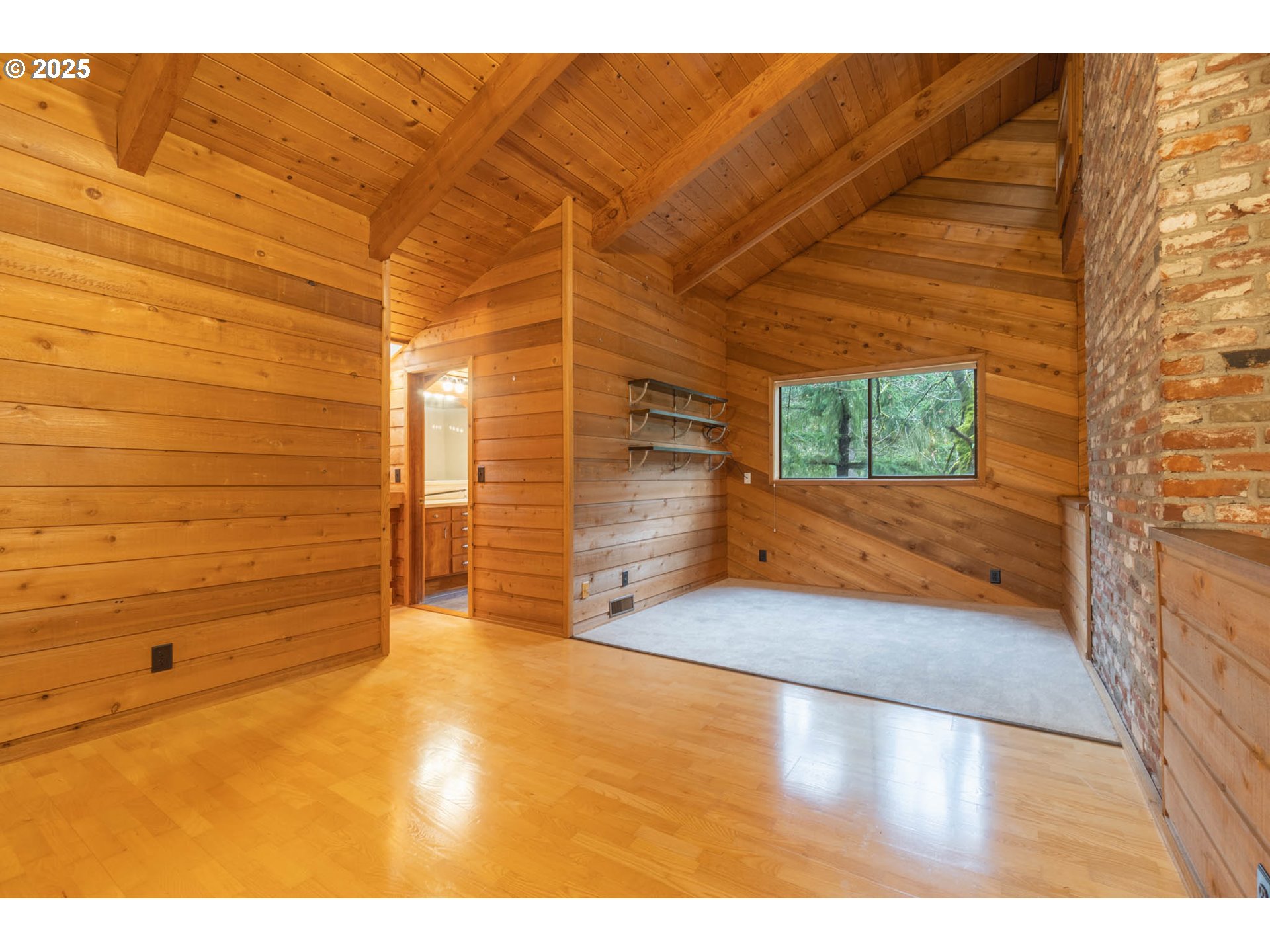 3054 Hendricks Hill Drive Eugene, OR 97403 - Photo 7 of 25 a view of an empty room and wooden floor