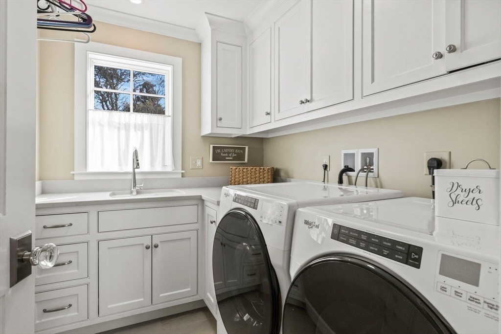 21 Hunter Rise Chatham, MA 02633 - Photo 12 of 37 a view of kitchen with sink washer and dryer