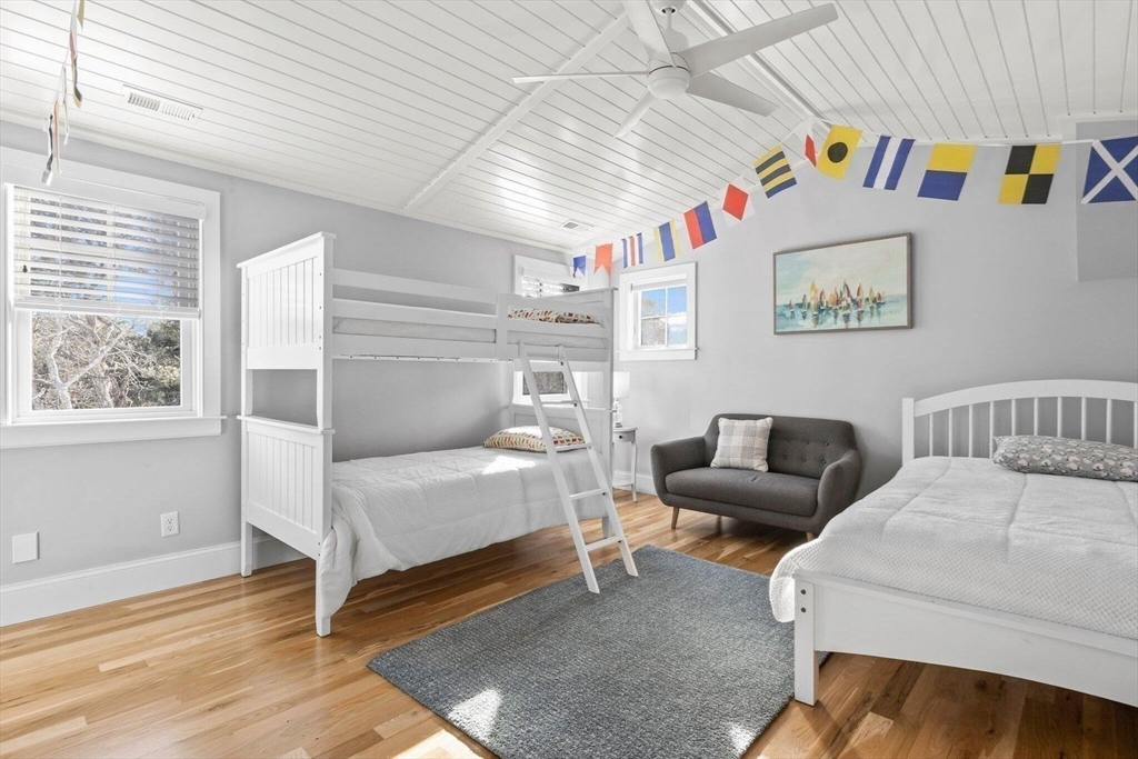 21 Hunter Rise Chatham, MA 02633 - Photo 22 of 37 a bedroom with furniture and a window