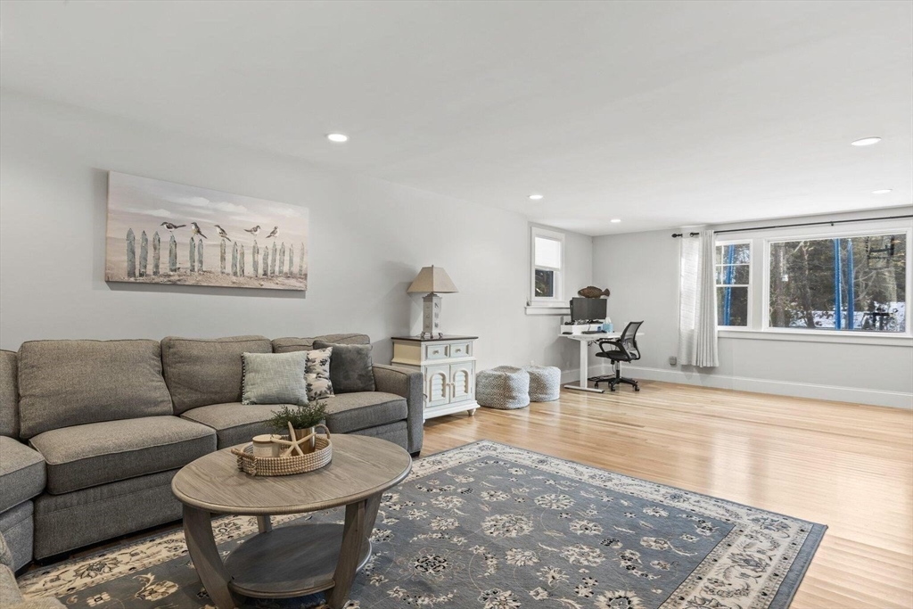 21 Hunter Rise Chatham, MA 02633 - Photo 28 of 37 a living room with furniture and a table