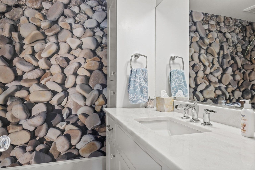 21 Hunter Rise Chatham, MA 02633 - Photo 30 of 37 a bathroom with a sink and a mirror