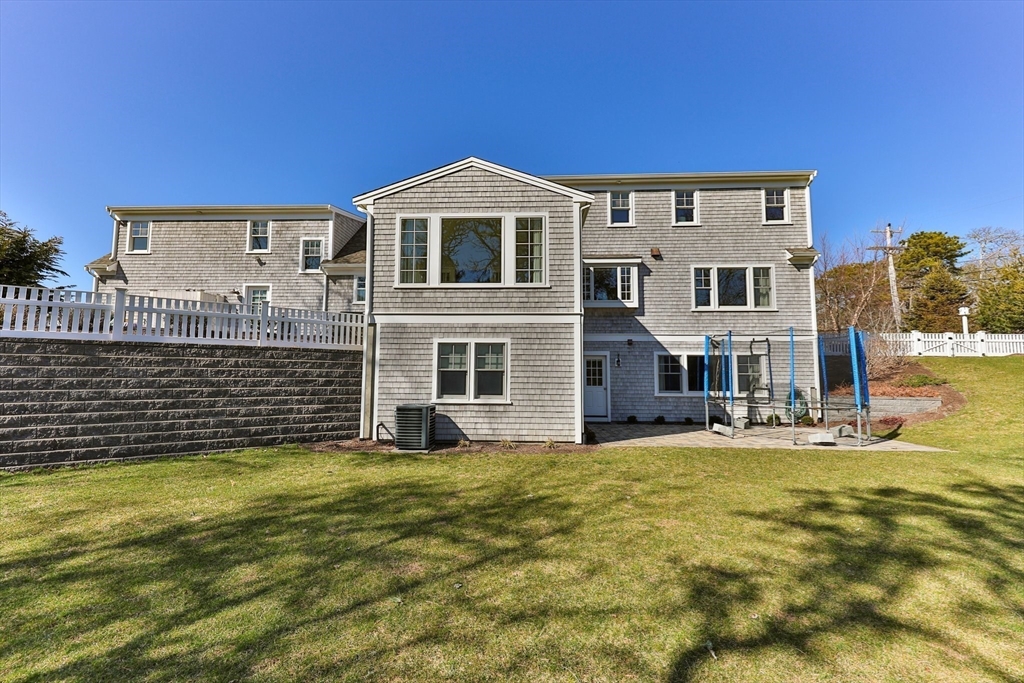 21 Hunter Rise Chatham, MA 02633 - Photo 32 of 37 a view of a house with a yard