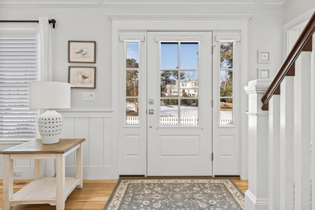 21 Hunter Rise Chatham, MA 02633 - Photo 4 of 37 a view of a bedroom with wooden floor and windows