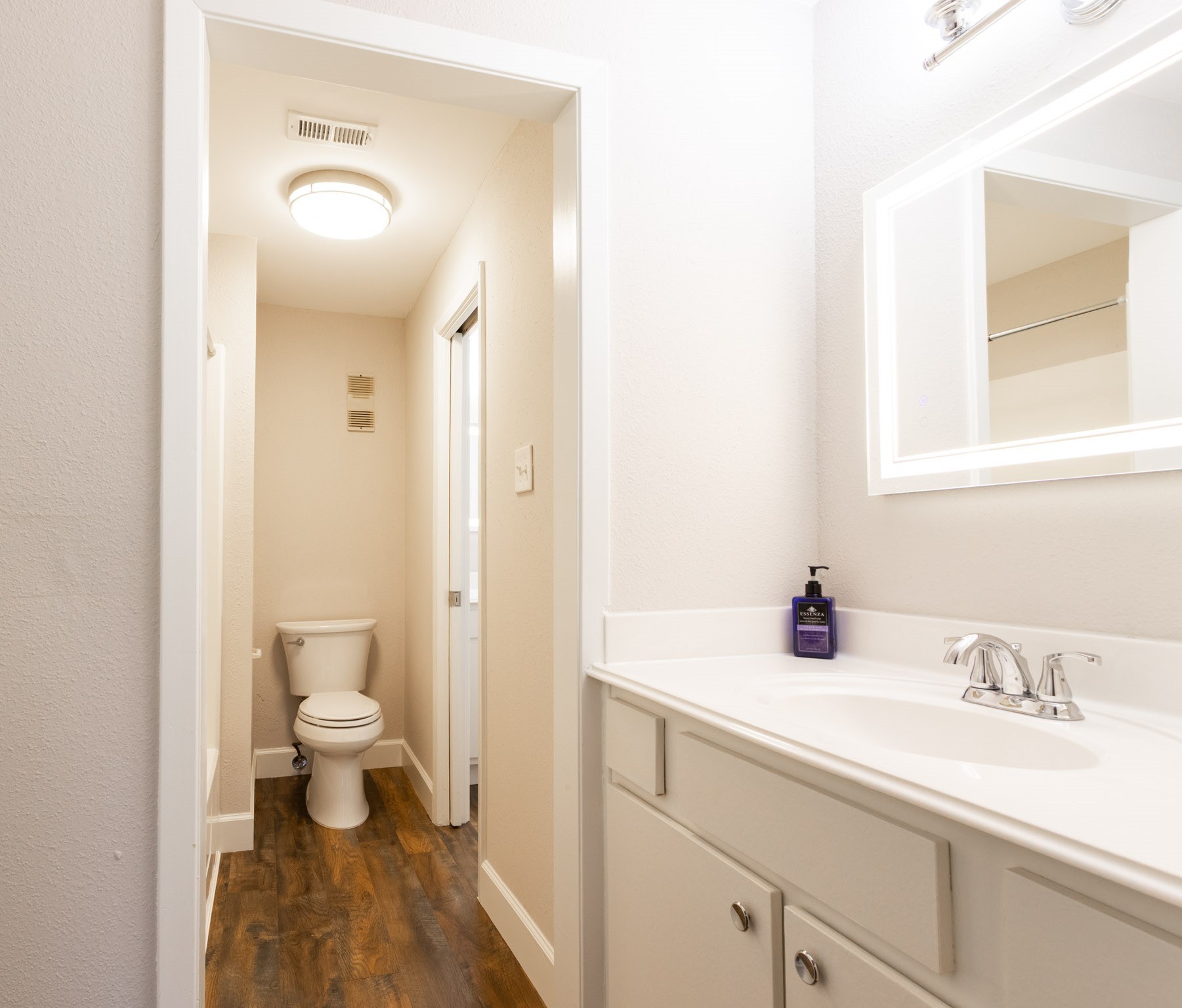 401 Lakeside Lane, Unit 111 Nassau Bay, TX 77058 - Photo 24 of 45 a bathroom with a sink and a mirror