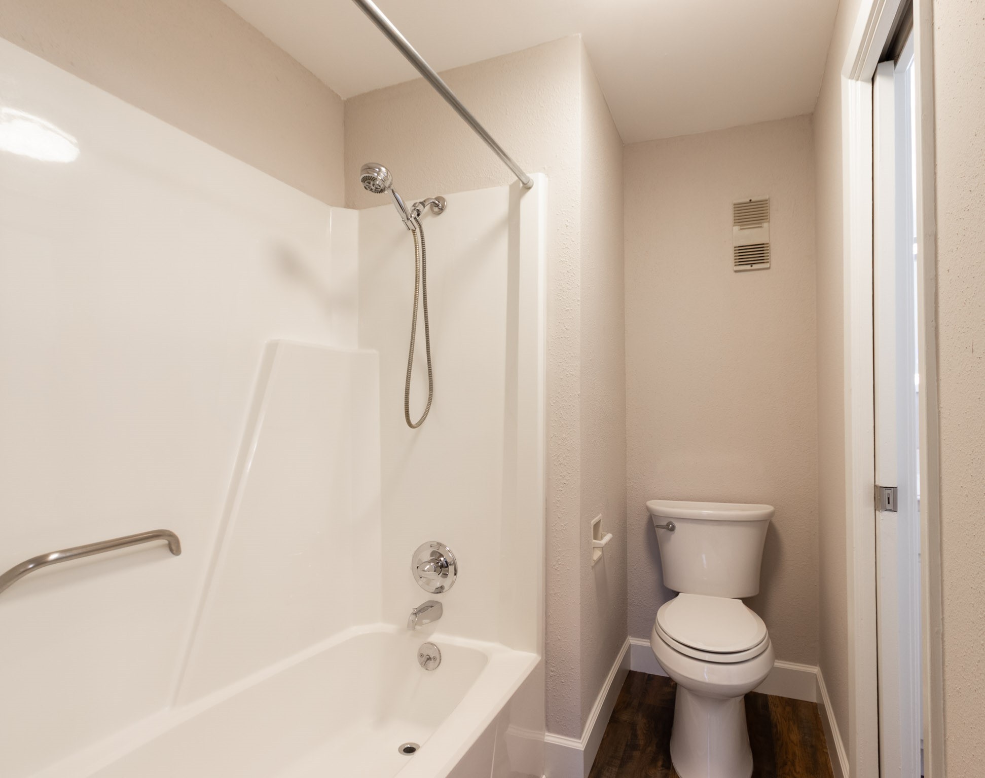401 Lakeside Lane, Unit 111 Nassau Bay, TX 77058 - Photo 25 of 45 a white toilet sitting next to a bath tub