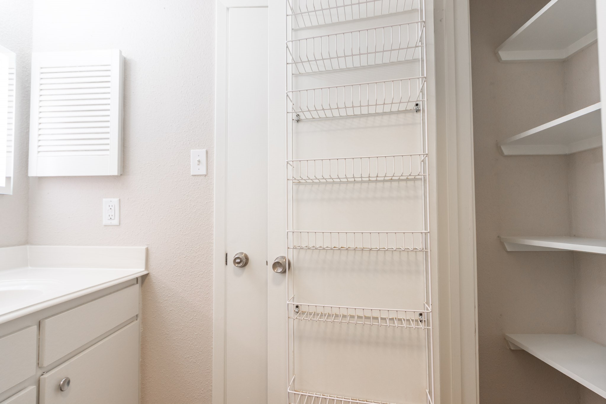 401 Lakeside Lane, Unit 111 Nassau Bay, TX 77058 - Photo 27 of 45 a bathroom with a shower and a sink