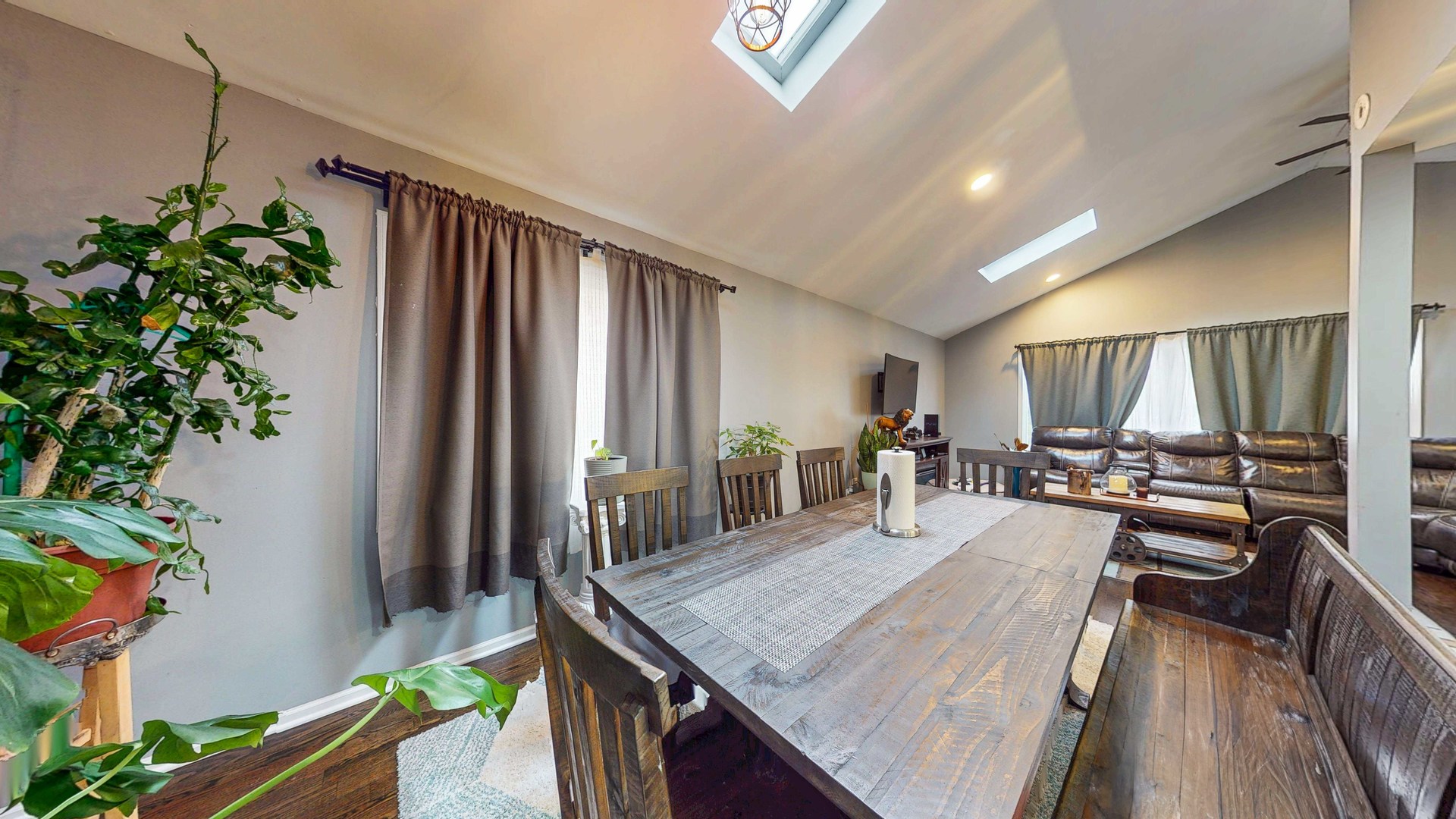 8129 45th Place Lyons, IL 60534 - Photo 16 of 45 a dining room with furniture and a potted plant