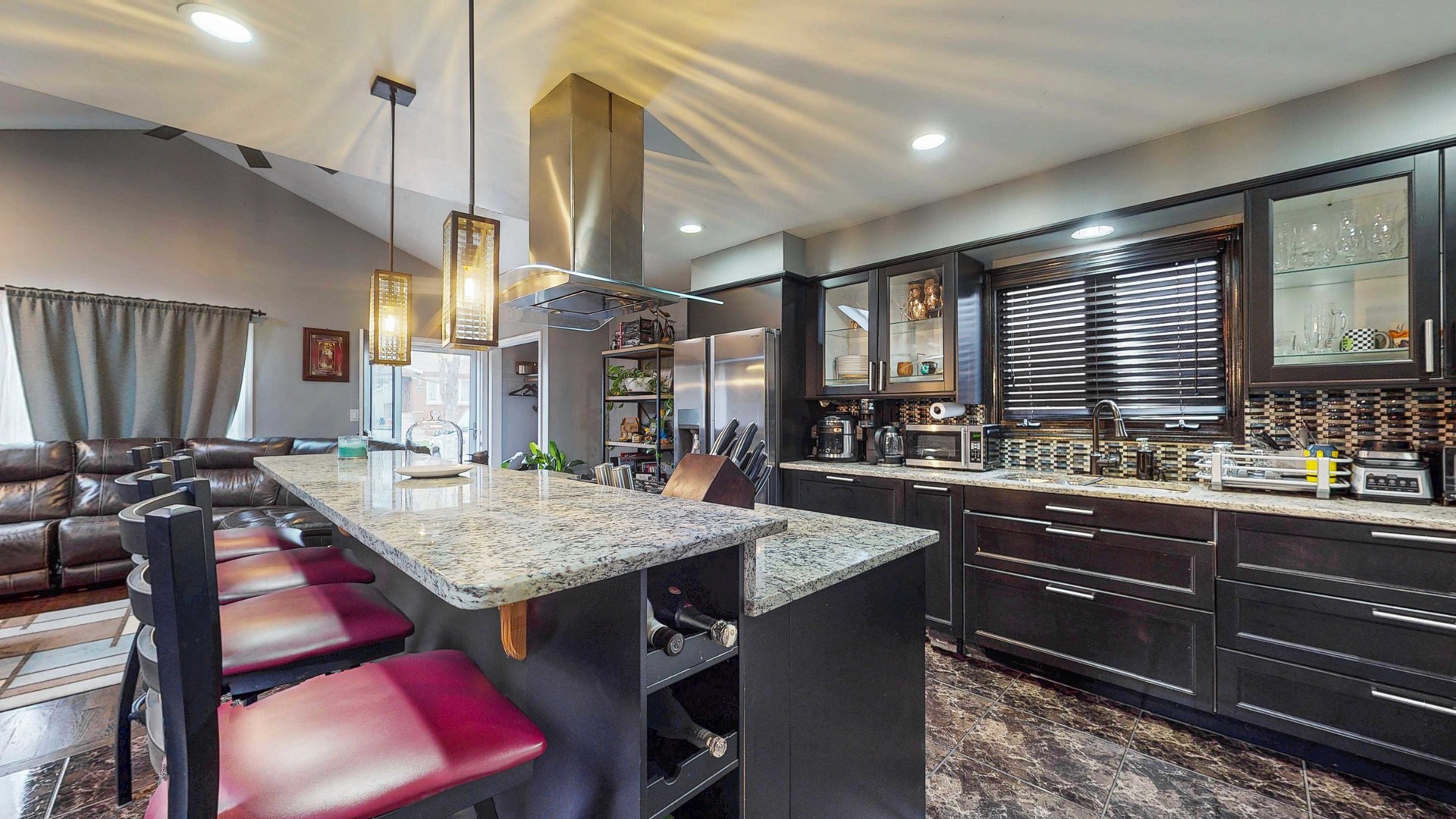 8129 45th Place Lyons, IL 60534 - Photo 19 of 45 a kitchen with a stove a sink and a refrigerator