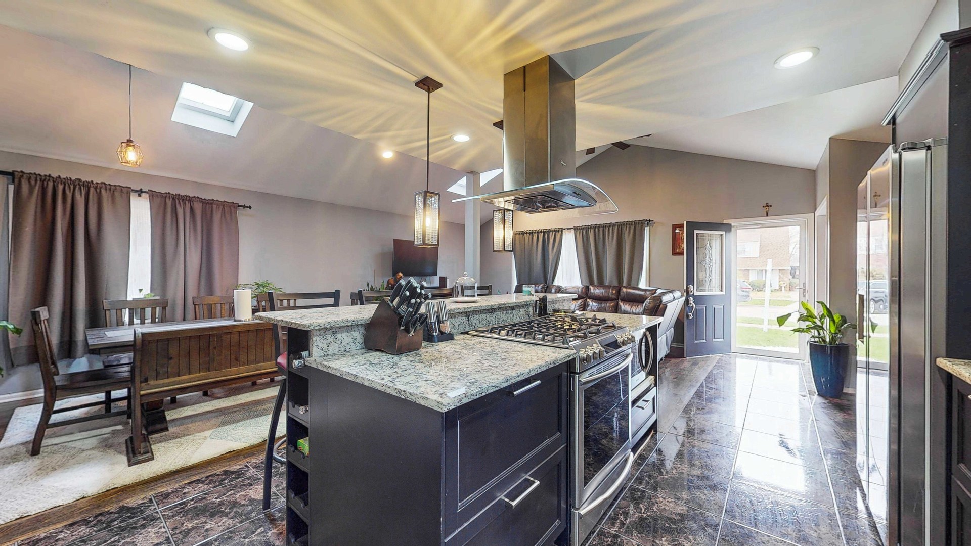 8129 45th Place Lyons, IL 60534 - Photo 20 of 45 a kitchen with a stove a refrigerator and a table