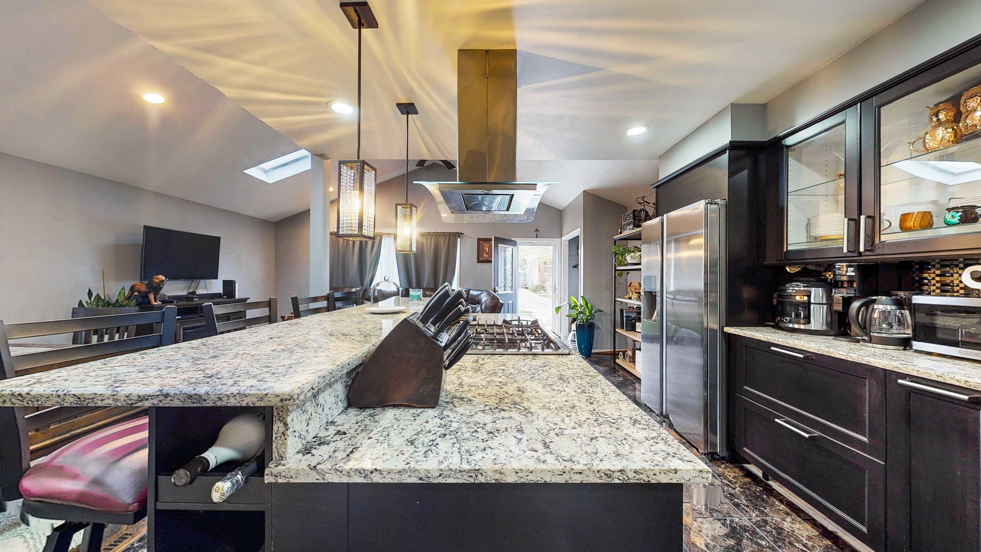 8129 45th Place Lyons, IL 60534 - Photo 22 of 45 a kitchen with stainless steel appliances granite countertop sink stove and refrigerator