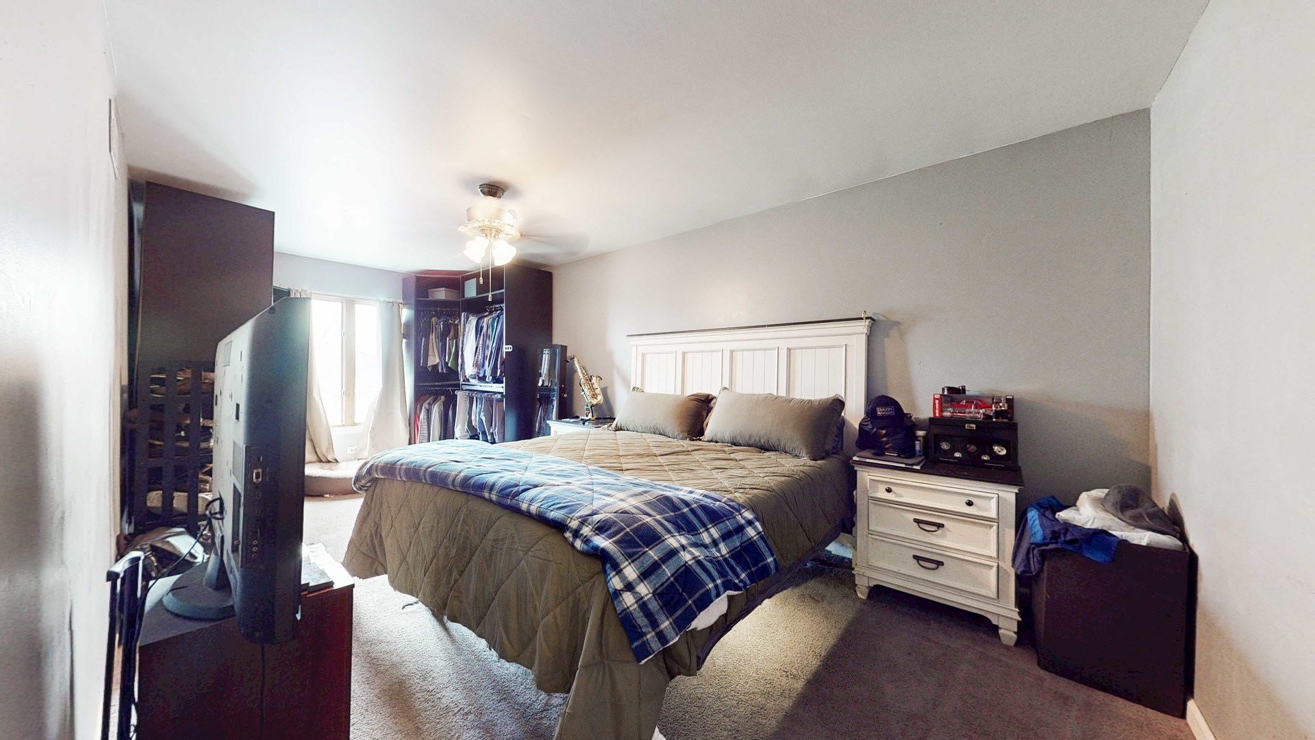 8129 45th Place Lyons, IL 60534 - Photo 26 of 45 a bedroom with a bed and a chandelier