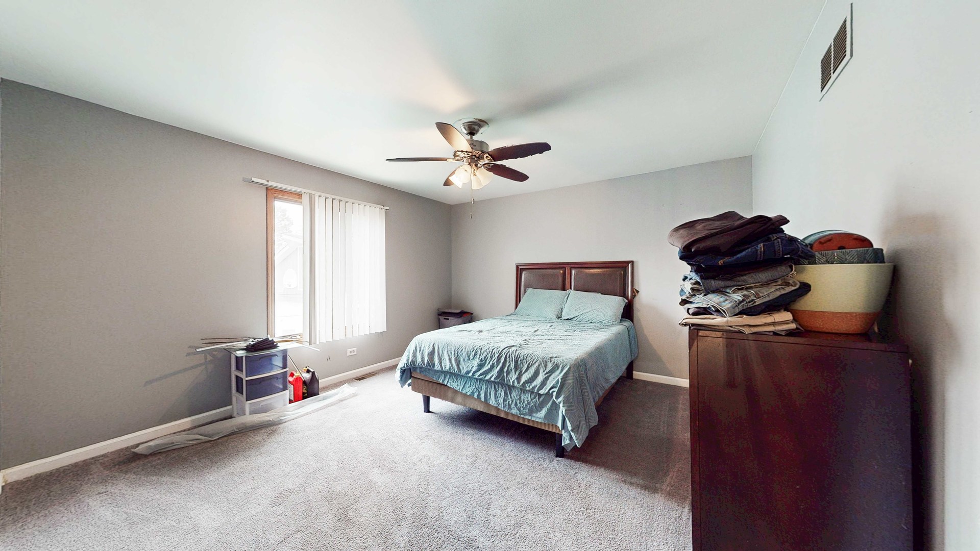 8129 45th Place Lyons, IL 60534 - Photo 30 of 45 a bedroom with a bed and a ceiling fan