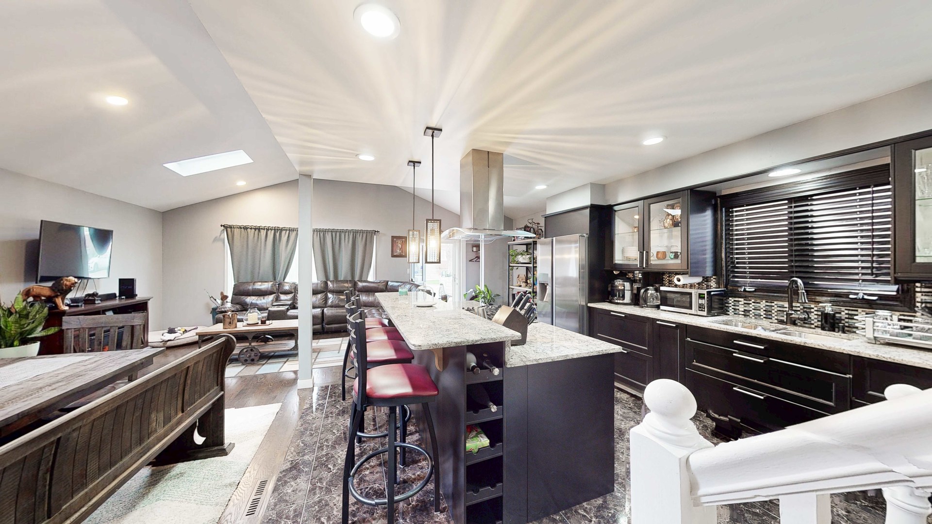 8129 45th Place Lyons, IL 60534 - Photo 32 of 45 a large kitchen with a table and chairs