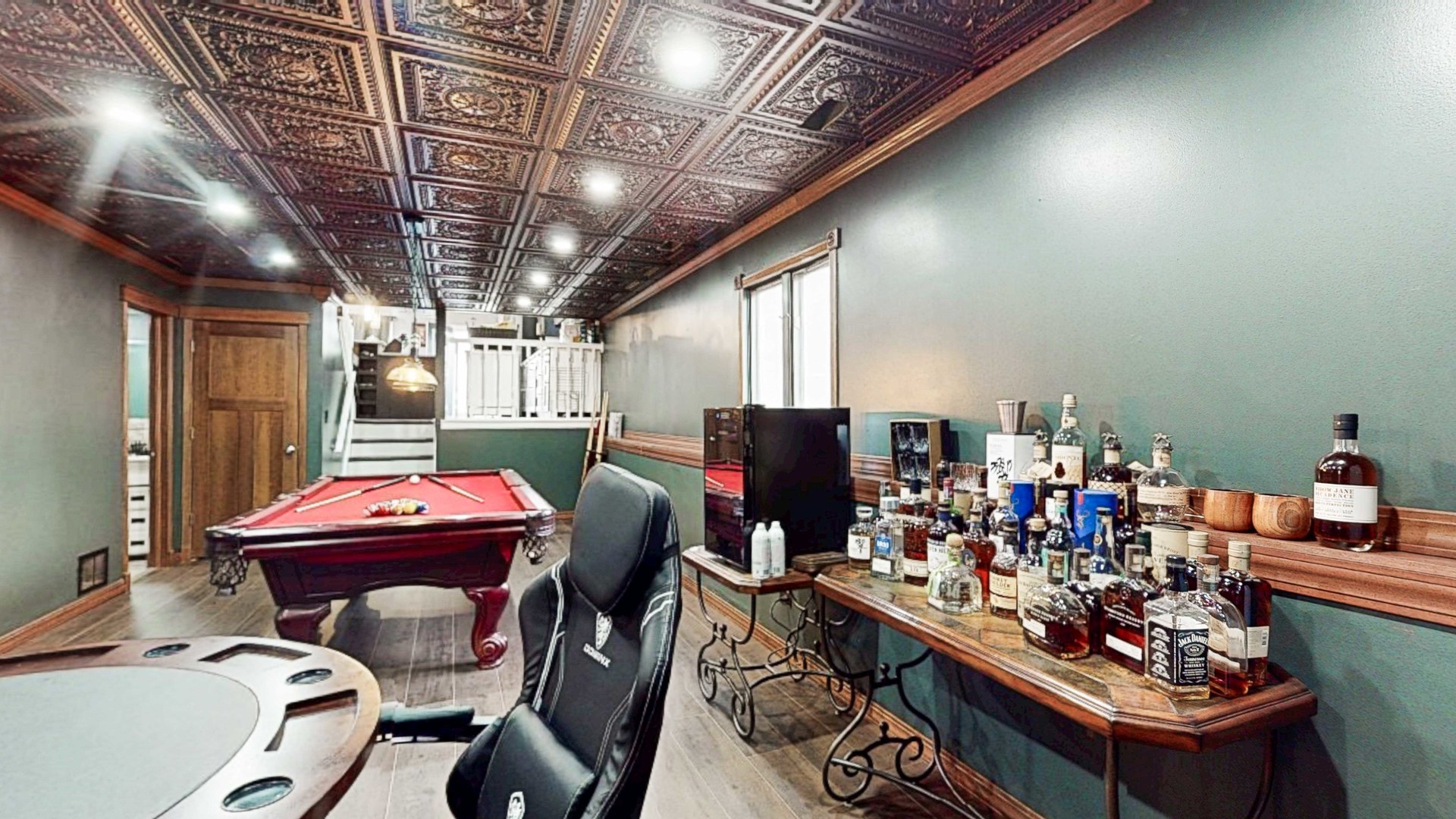 8129 45th Place Lyons, IL 60534 - Photo 38 of 45 a room with furniture and a chandelier