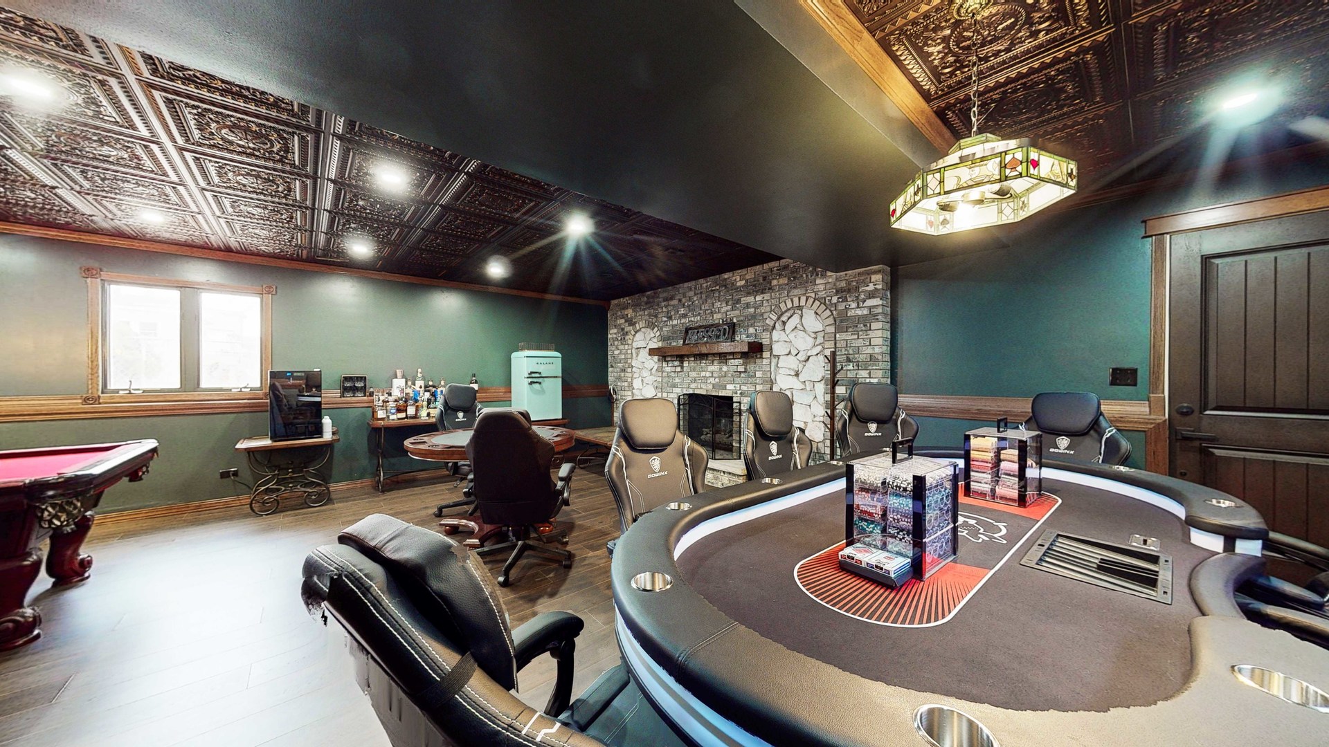 8129 45th Place Lyons, IL 60534 - Photo 40 of 45 a living room with furniture chandelier and a fireplace