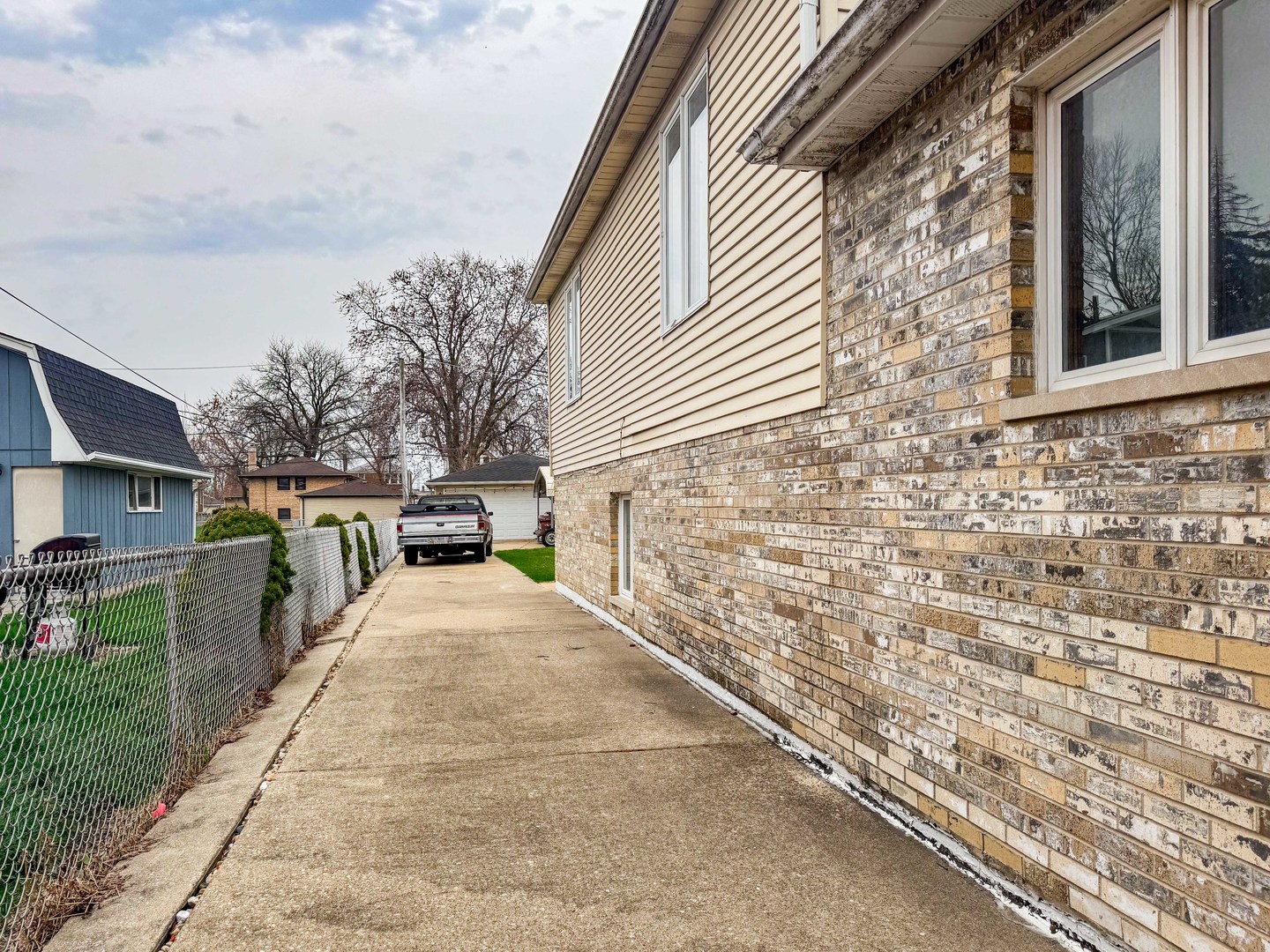 8129 45th Place Lyons, IL 60534 - Photo 4 of 45 a view of a backyard with furniture