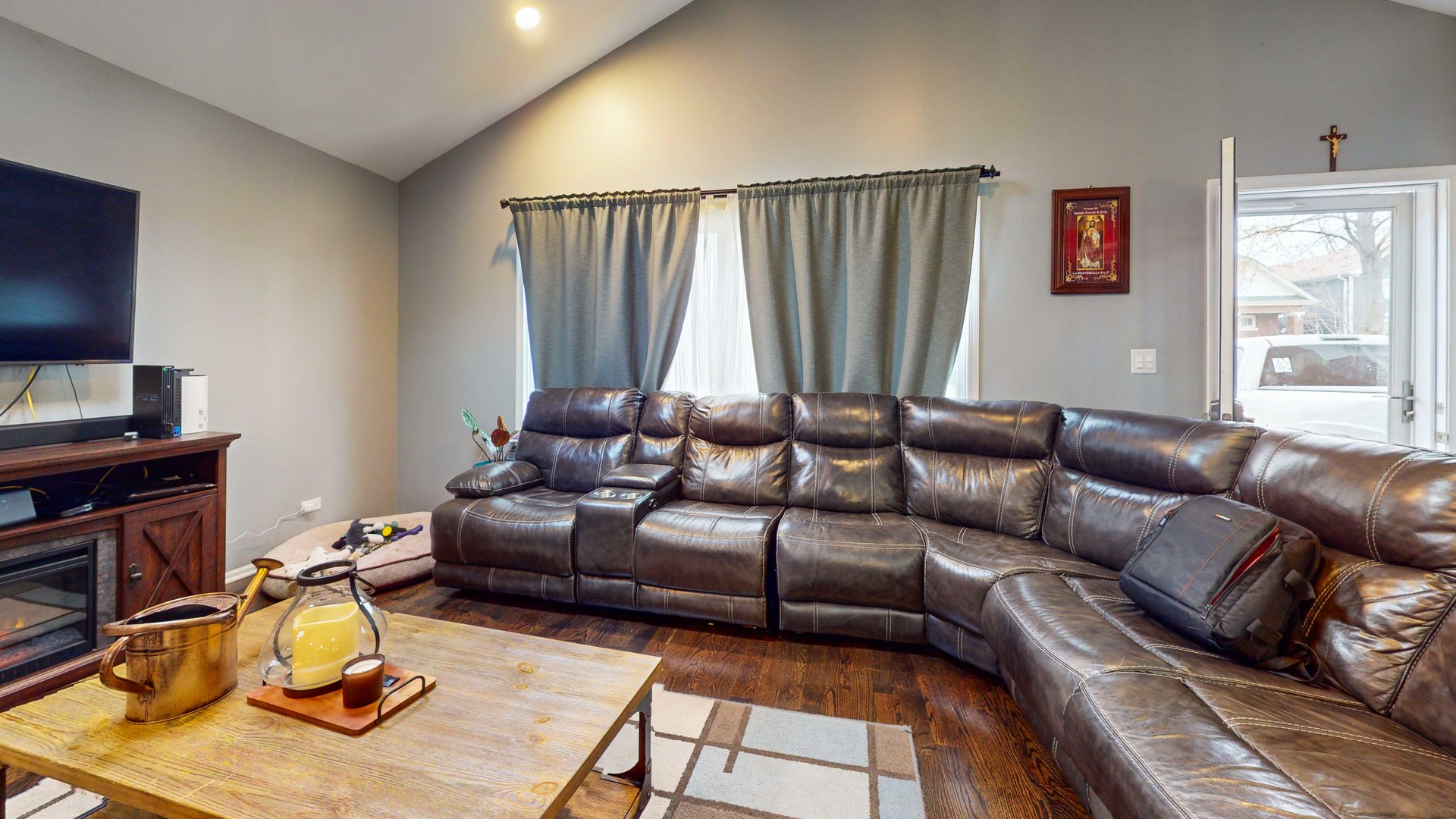 8129 45th Place Lyons, IL 60534 - Photo 5 of 45 a living room with furniture a flat screen tv and a window