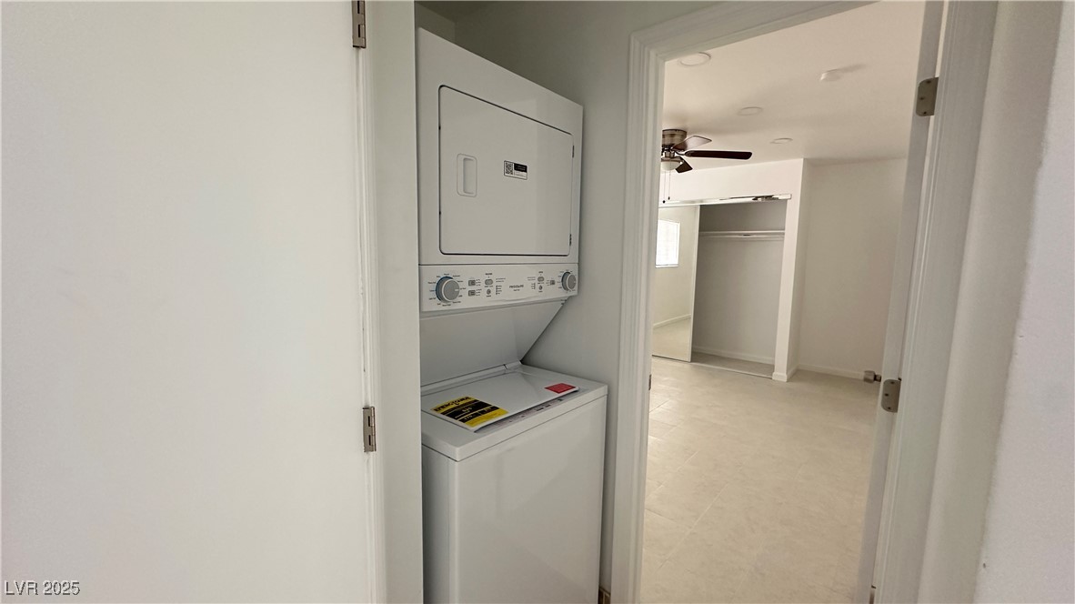 5108 Greene Lane, Unit D Las Vegas, NV 89119 - Photo 6 of 16 Laundry area featuring stacked washer / drying machine and ceiling fan