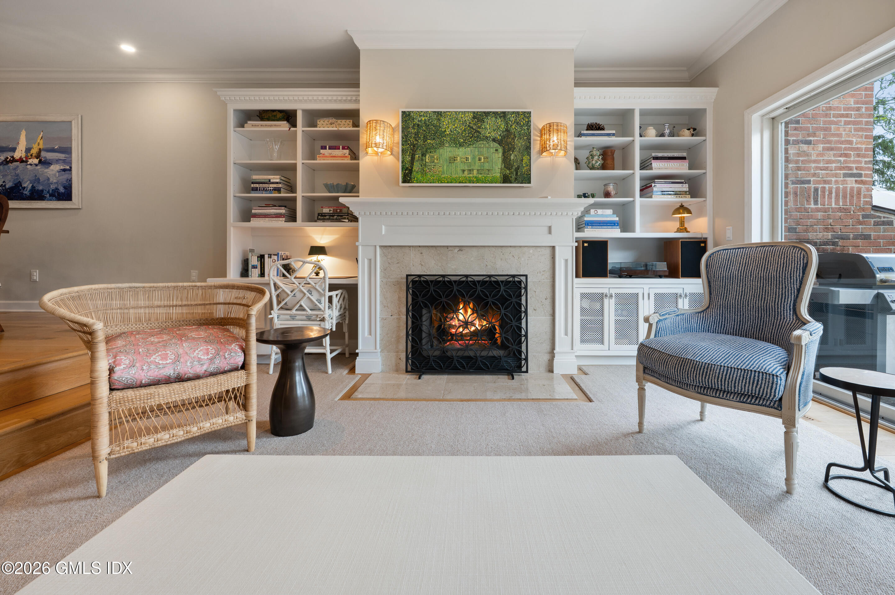 115 River Road, Unit 3 Cos Cob, CT 06807 - Photo 20 of 40 a living room with furniture and a fireplace