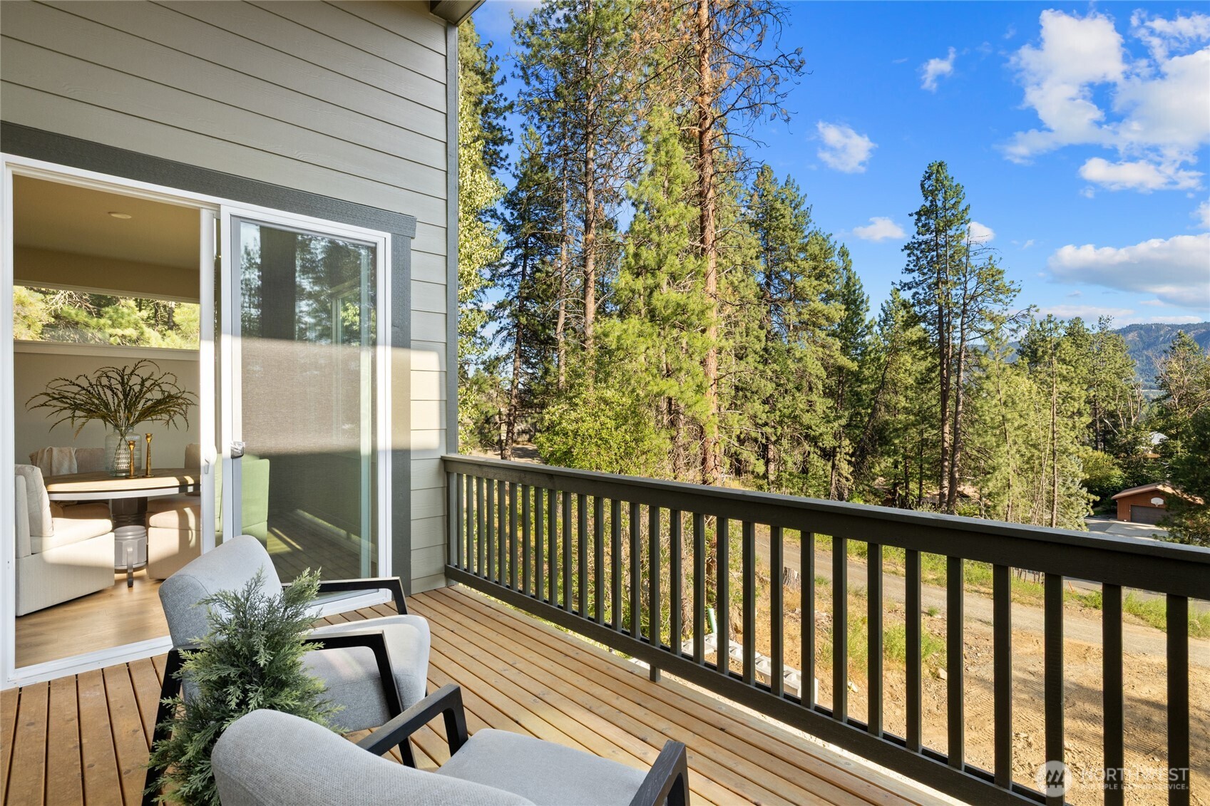 403 Outfitter Place Cle Elum, WA 98922 - Photo 5 of 28 a balcony with chairs