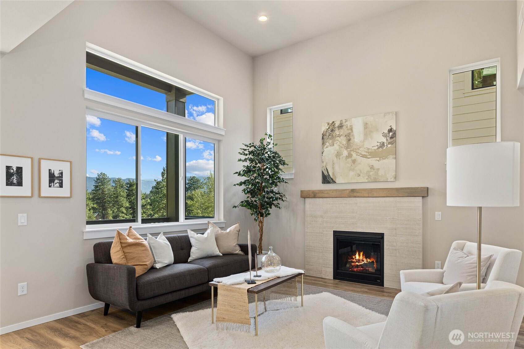 403 Outfitter Place Cle Elum, WA 98922 - Photo 6 of 28 a living room with furniture a window and a fireplace