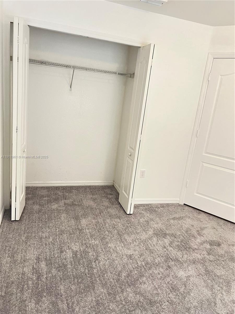 12906 Southwest 30th Street, Unit 134 Miramar, FL 33027 - Photo 9 of 13 a view of an empty room