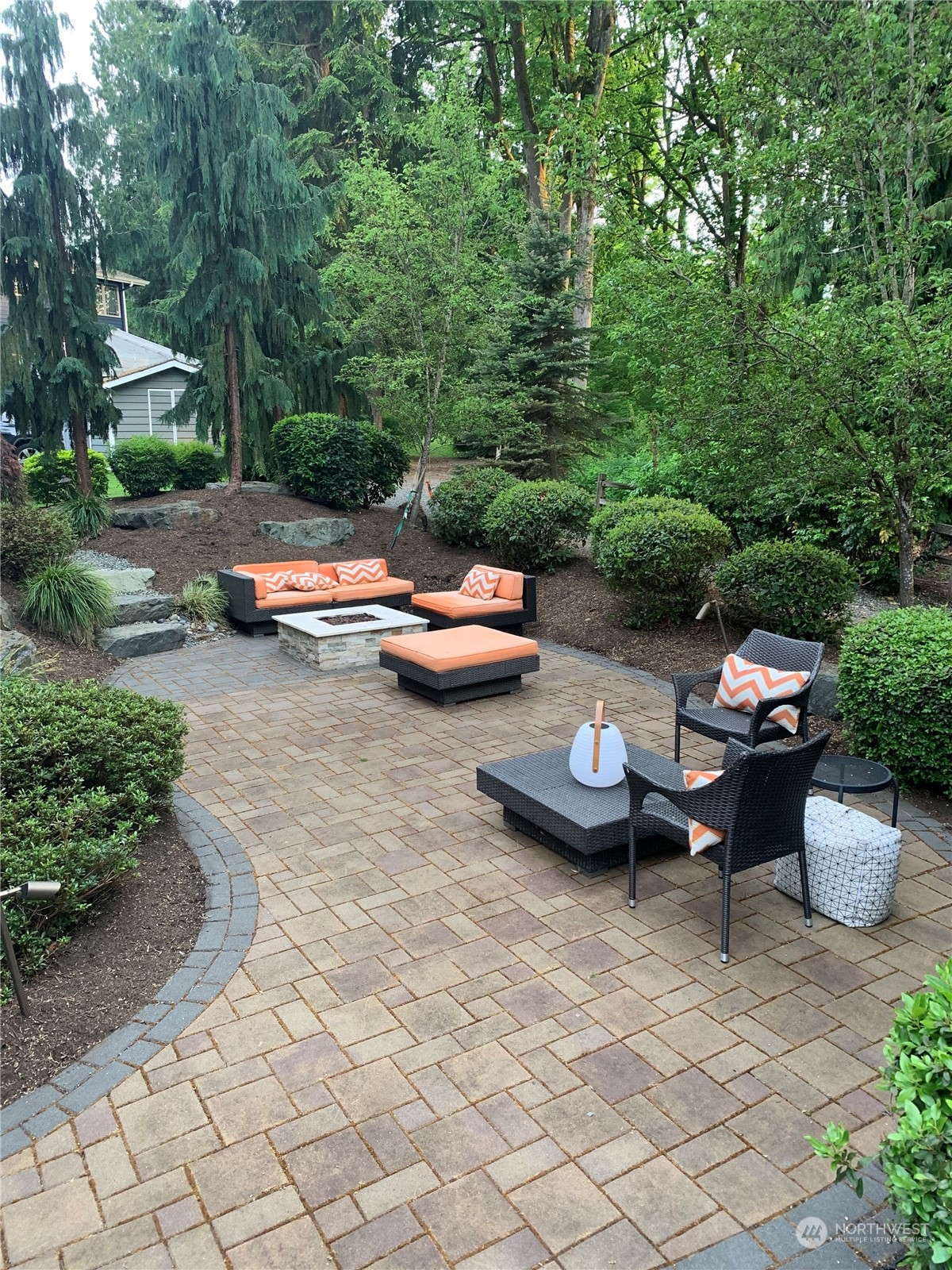23340 13th Avenue Southeast Bothell, WA 98021 - Photo 36 of 36 a view of a patio with fire pit and a yard