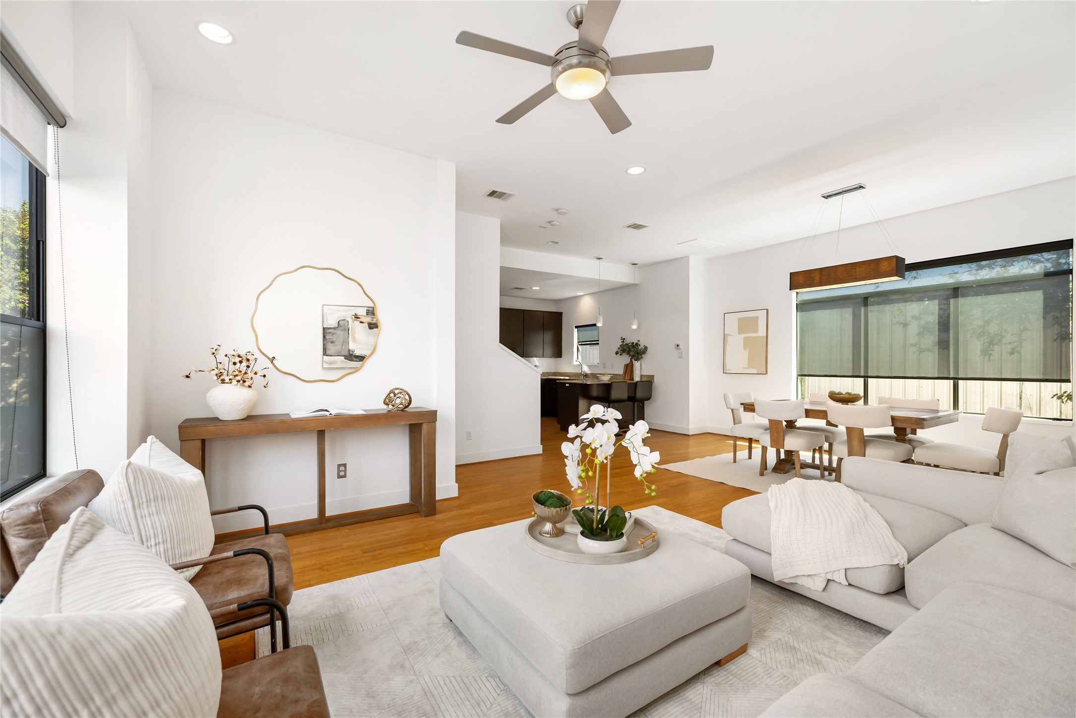 5012 Cornish Street Houston, TX 77007 - Photo 14 of 38 a living room with furniture a flat screen tv and a large window