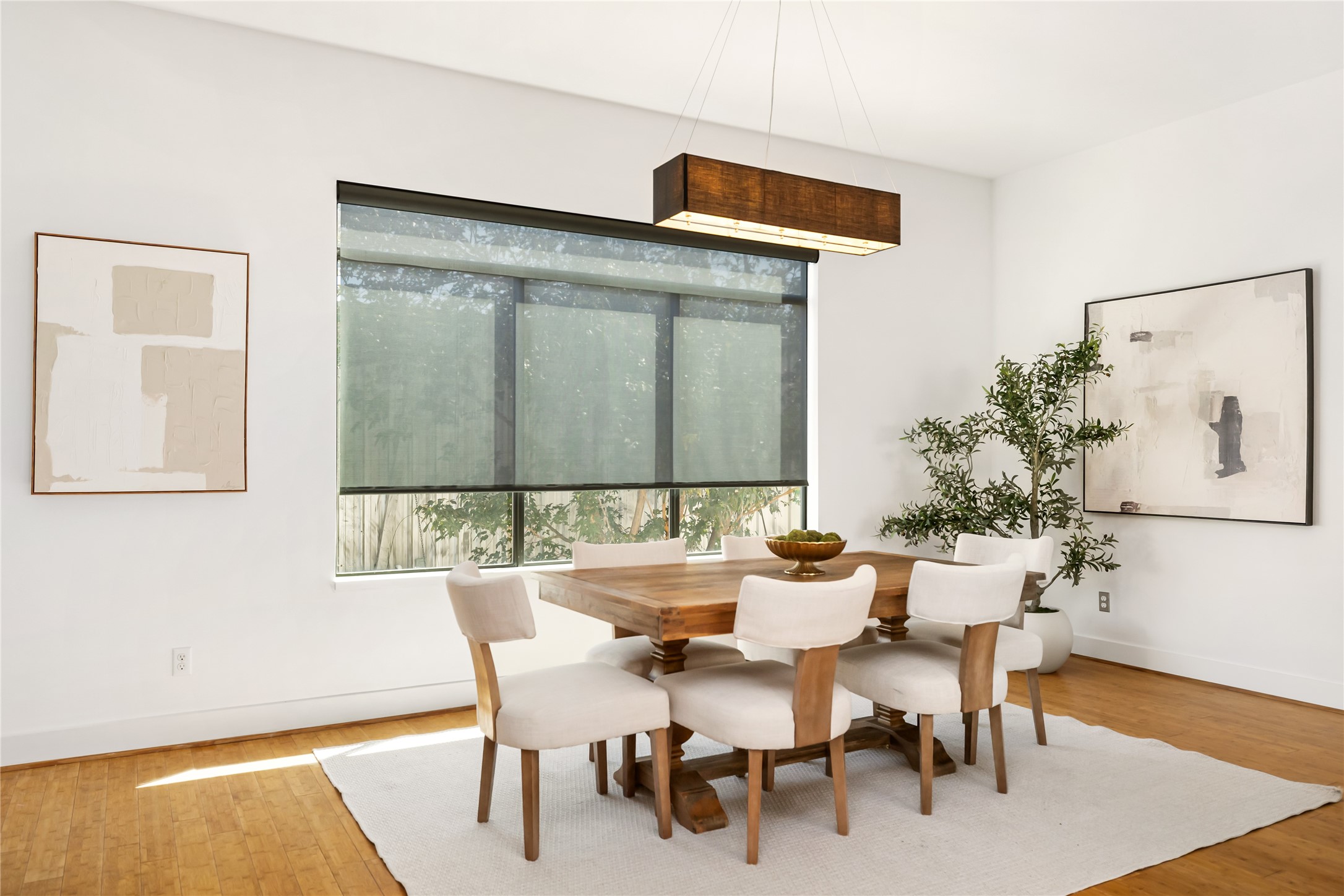 5012 Cornish Street Houston, TX 77007 - Photo 17 of 38 a view of a dining room with furniture and wooden floor