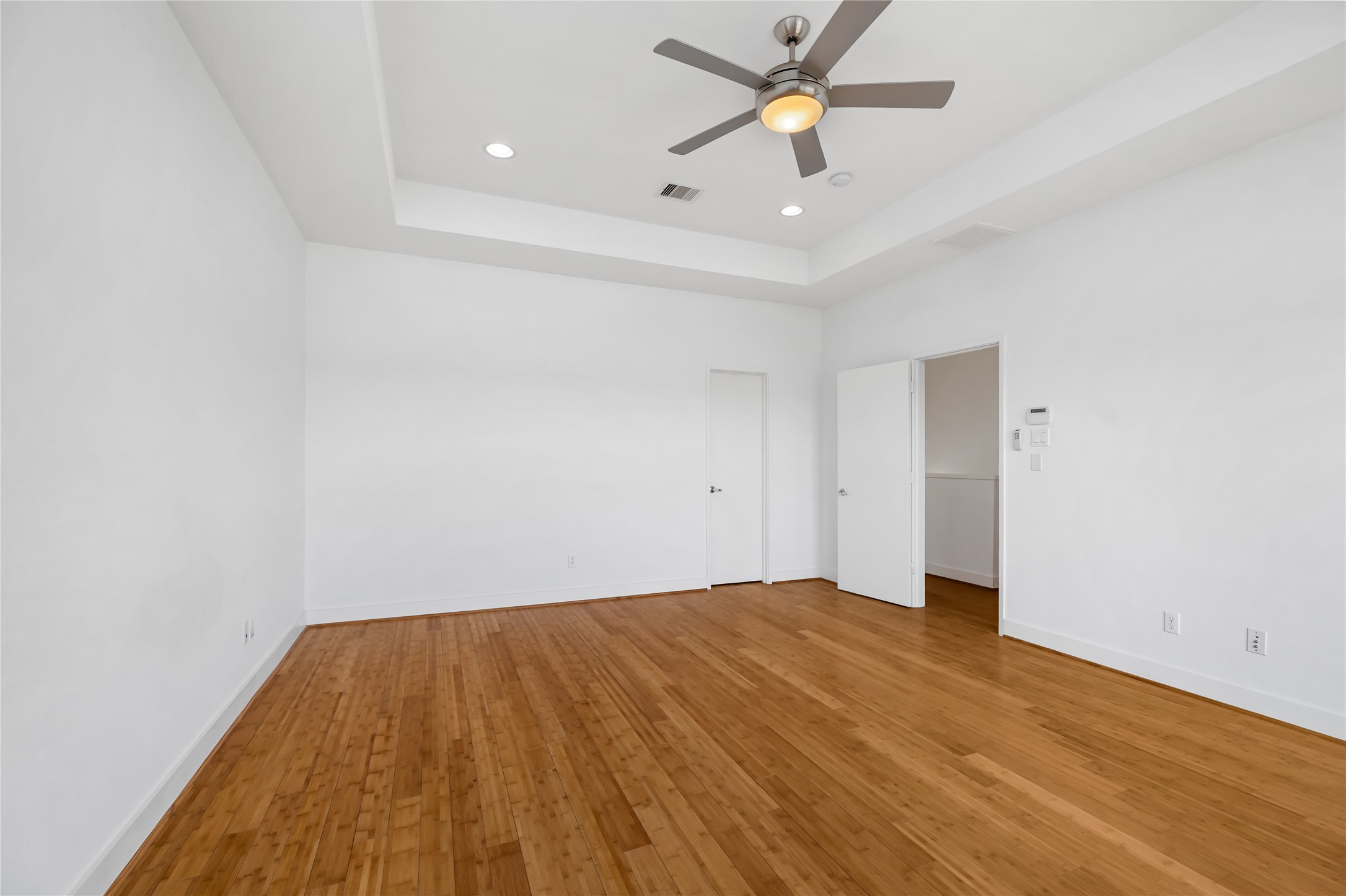 5012 Cornish Street Houston, TX 77007 - Photo 25 of 38 a view of empty room with wooden floor