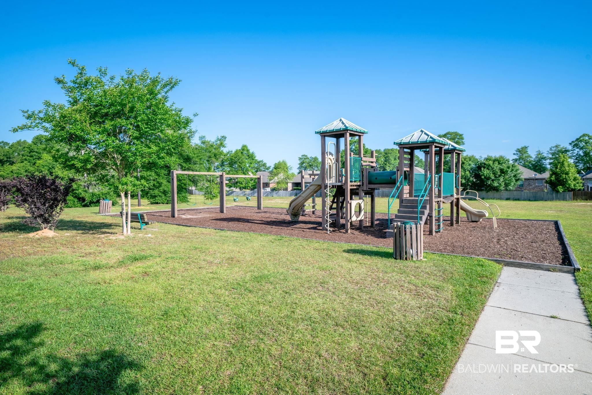 2183 Meadowview Loop Semmes, AL 36575 - Photo 55 of 58 Community jungle gym featuring a yard