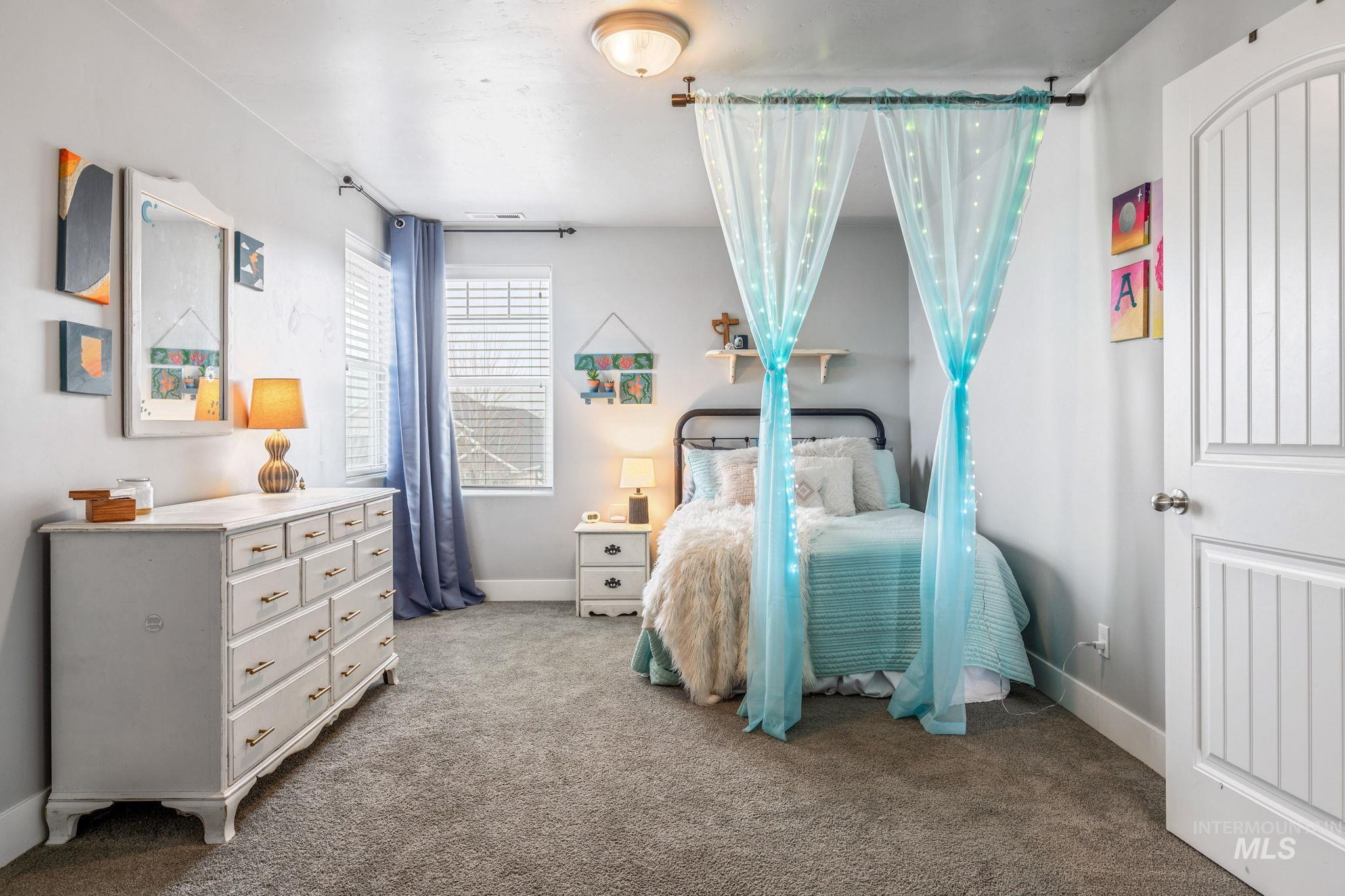 1127 Overland Trail Street Middleton, ID 83644 - Photo 18 of 24 Large bedroom with walk-in closet and carpet