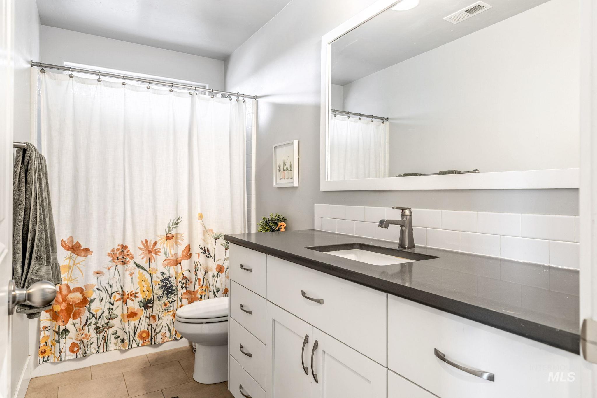 1127 Overland Trail Street Middleton, ID 83644 - Photo 20 of 24 Full bathroom with vanity and light tile patterned floors