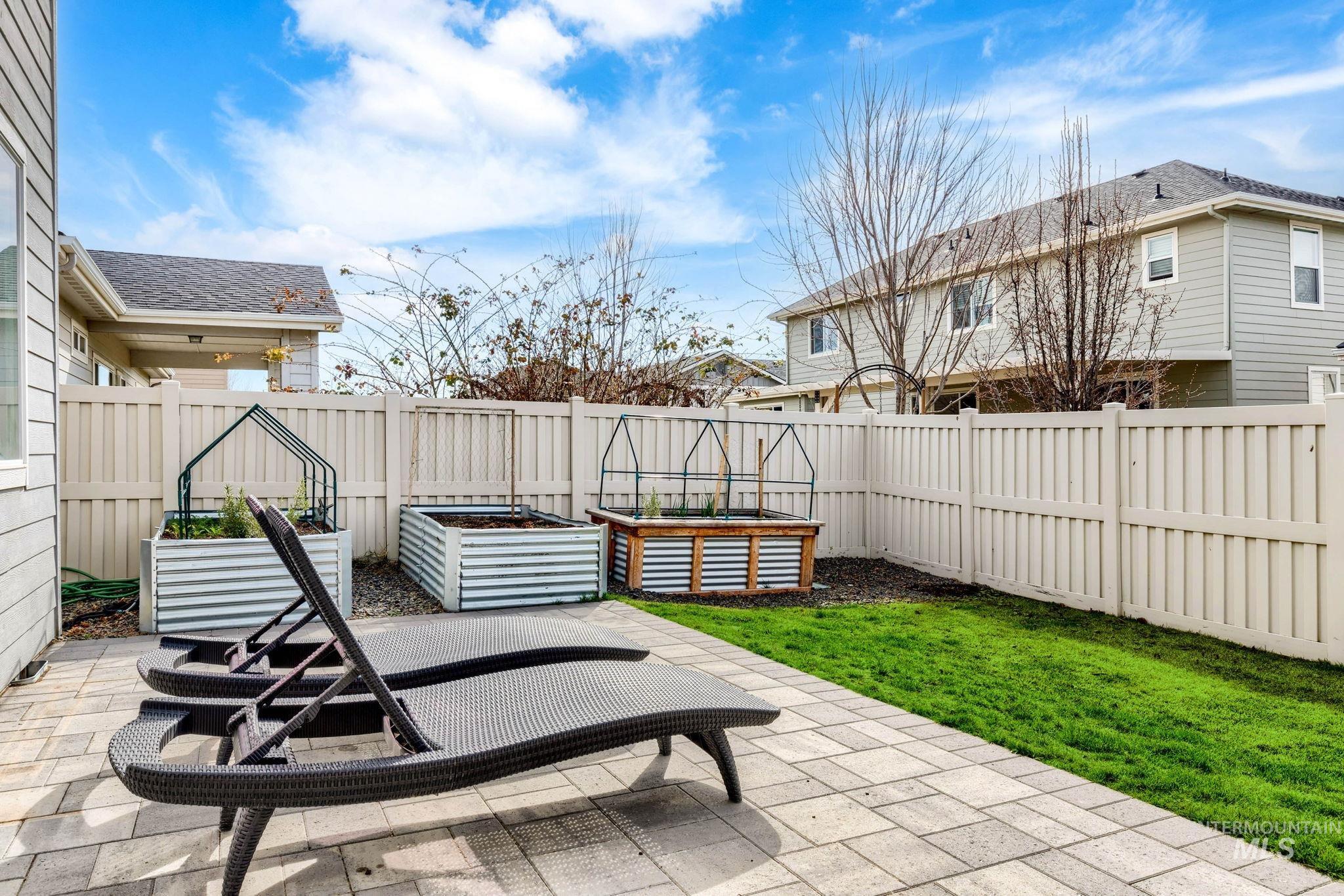 1127 Overland Trail Street Middleton, ID 83644 - Photo 24 of 24 Fenced backyard featuring a patio and a garden