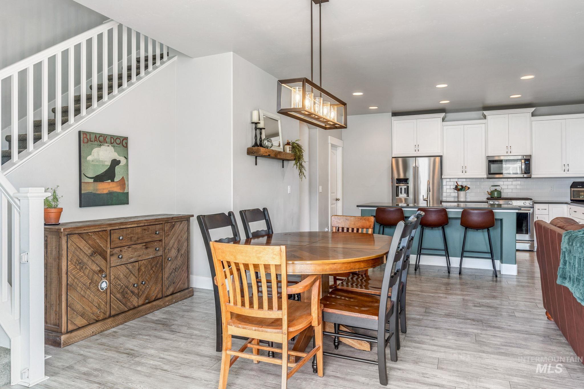 1127 Overland Trail Street Middleton, ID 83644 - Photo 4 of 24 Dining room with recessed lighting open concept and light wood-style floors