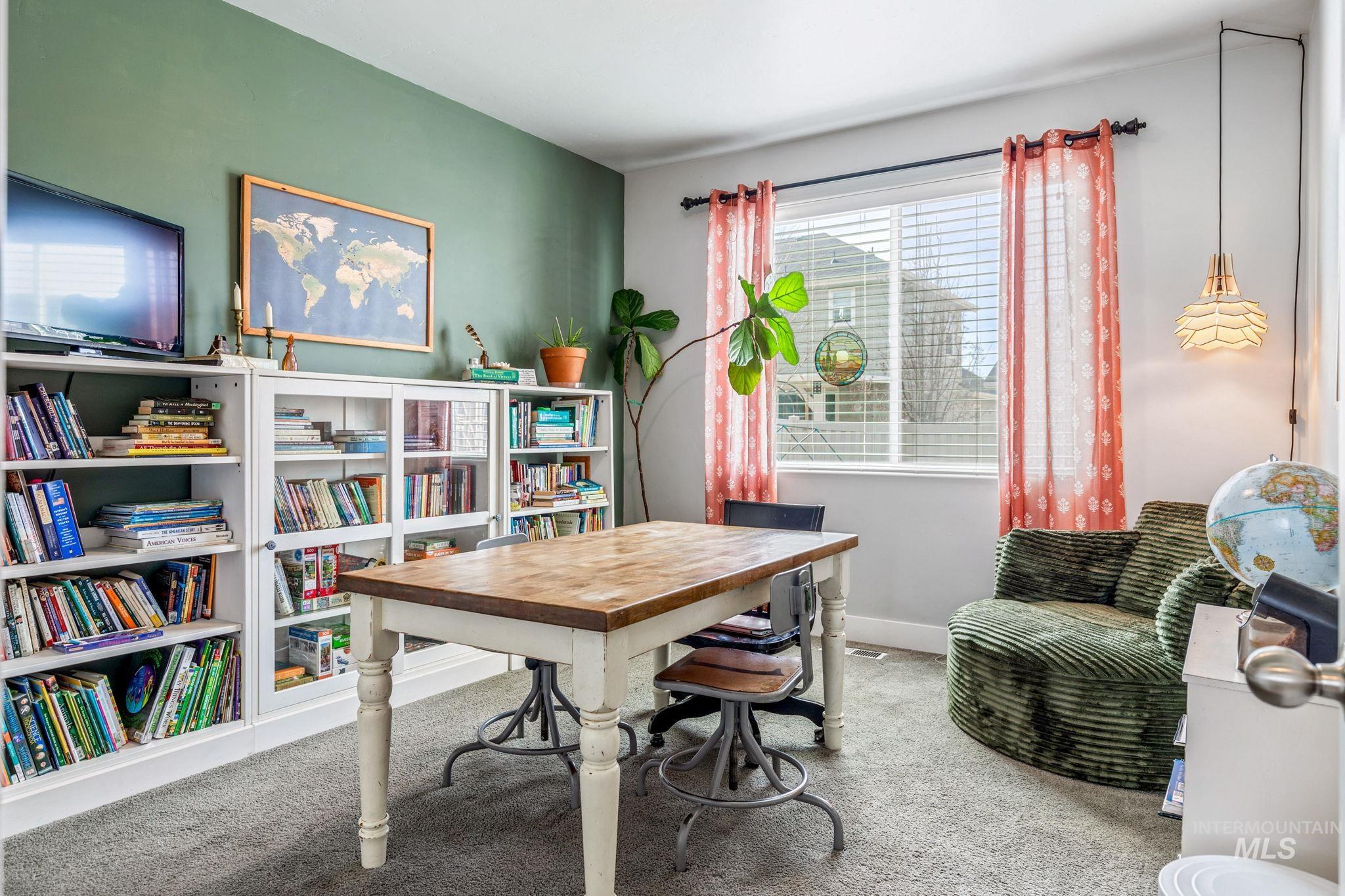 1127 Overland Trail Street Middleton, ID 83644 - Photo 10 of 24 Bedroom with closet and carpet being used as a homeschool room.