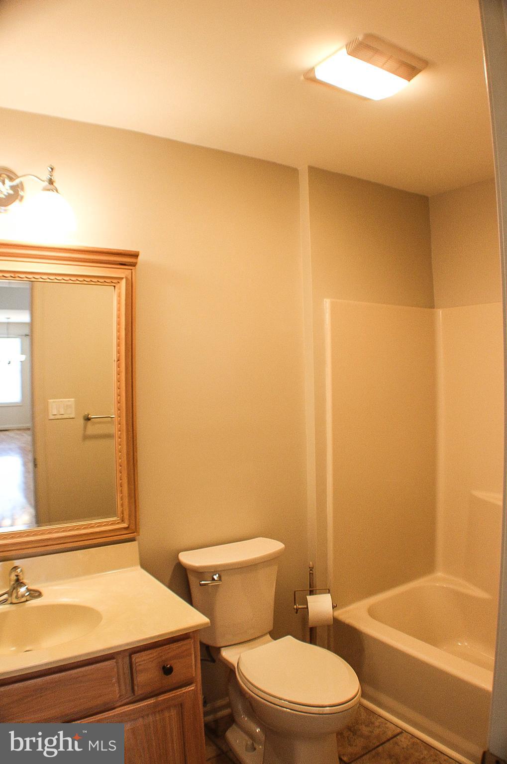 187 North Planters Lane Dover, DE 19901 - Photo 28 of 28 a bathroom with a toilet and a sink