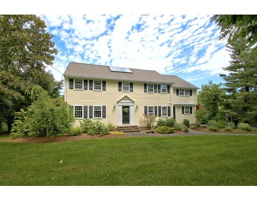 855 Boston Post Road Weston, MA 02493 - Photo 1 of 18 a front view of a house with a garden