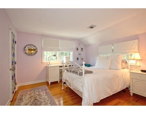 855 Boston Post Road Weston, MA 02493 - Photo 11 of 18 a bedroom with a bed and a large window