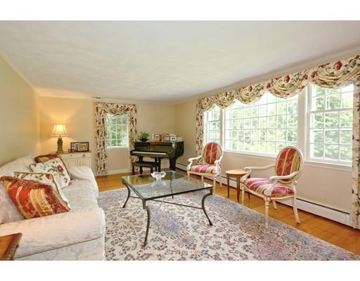 855 Boston Post Road Weston, MA 02493 - Photo 13 of 18 a living room with furniture and a large window