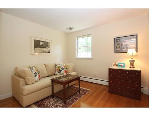 855 Boston Post Road Weston, MA 02493 - Photo 16 of 18 a living room with furniture and a window