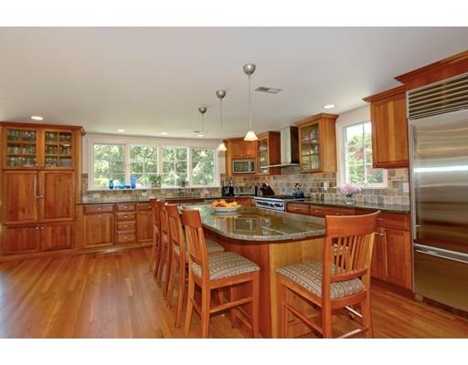 855 Boston Post Road Weston, MA 02493 - Photo 3 of 18 a kitchen with stainless steel appliances granite countertop a sink and a refrigerator