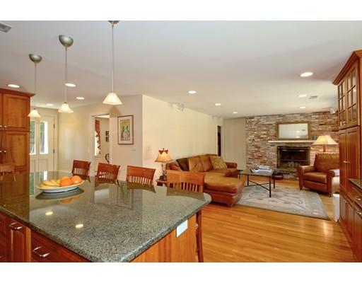 855 Boston Post Road Weston, MA 02493 - Photo 5 of 18 a living room with furniture a fireplace and kitchen view