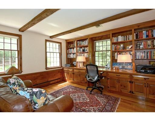 855 Boston Post Road Weston, MA 02493 - Photo 7 of 18 a living room filled with furniture and a bookshelf